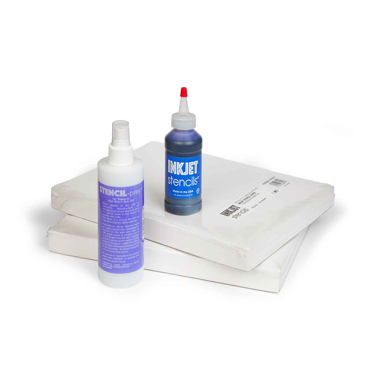 Two bottles of 'Inkjet Stencils' and a sheet of white paper on a white background
