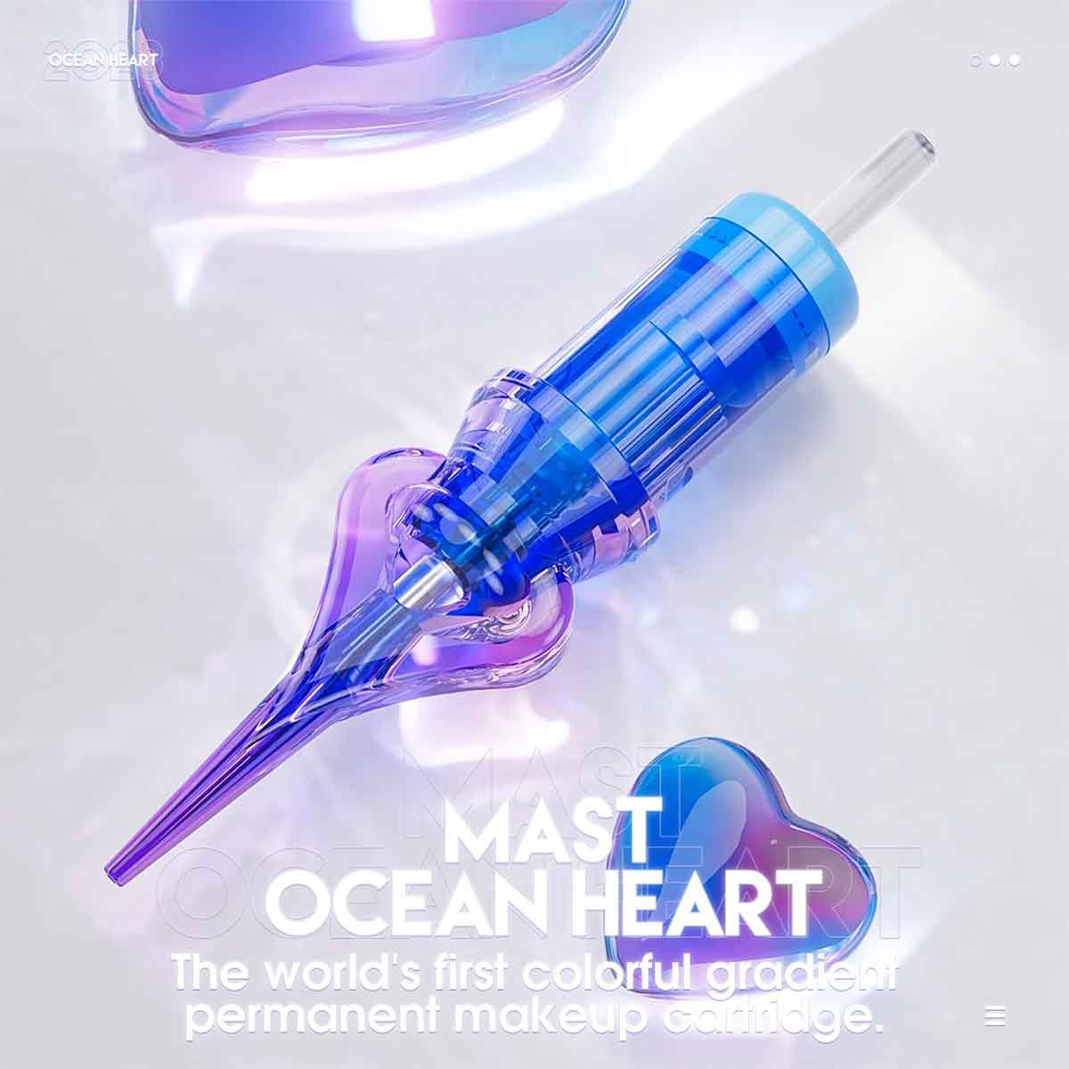 A blue and purple gradient cosmetic applicator pen with a clear tip, shown on a glossy white surface with decorative text reading 'MAST OCEAN HEART' and 'The world's first colorful gradient permanent makeup cartridge.'.