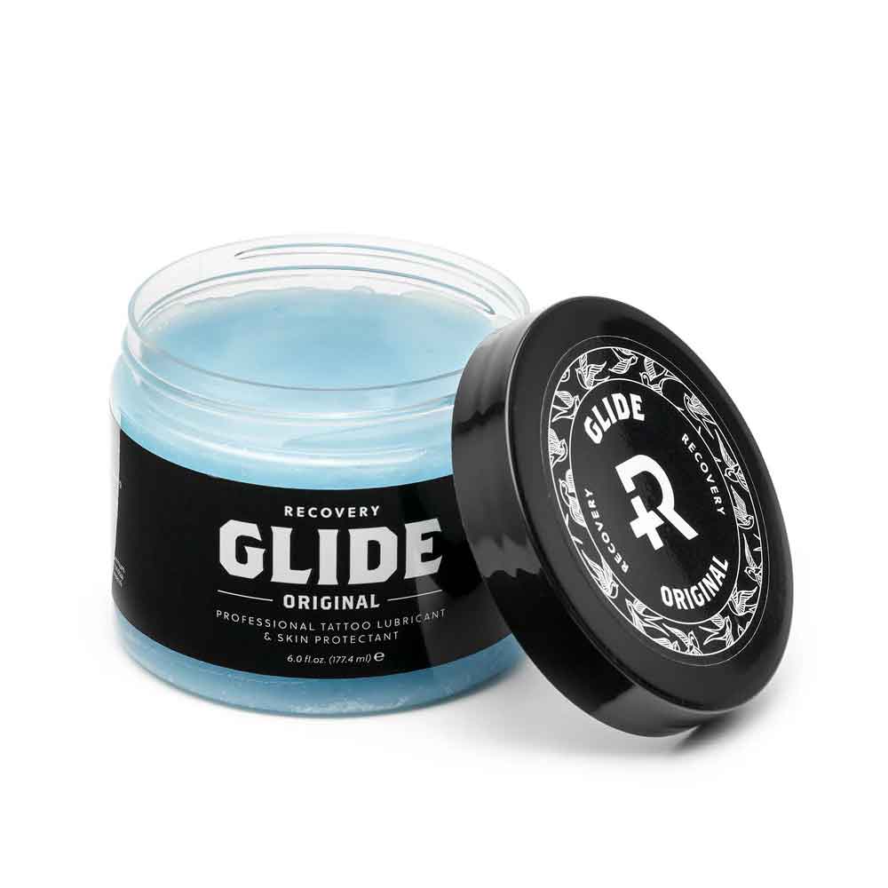 Jar of Glide Original lubricant with black lid on a white background